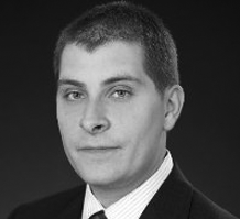 Portrait of Tomasz Scislowski, Director of Operations, Security of USIS

